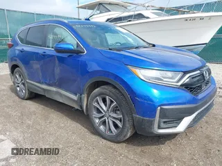 2020 Honda CR-V Touring with VIN 7FARW2H97LE011107, listed as a IAAI auction lot 42144993 with 60,963 mi miles and . Bid and sale history available at DreamBid. Image 1.