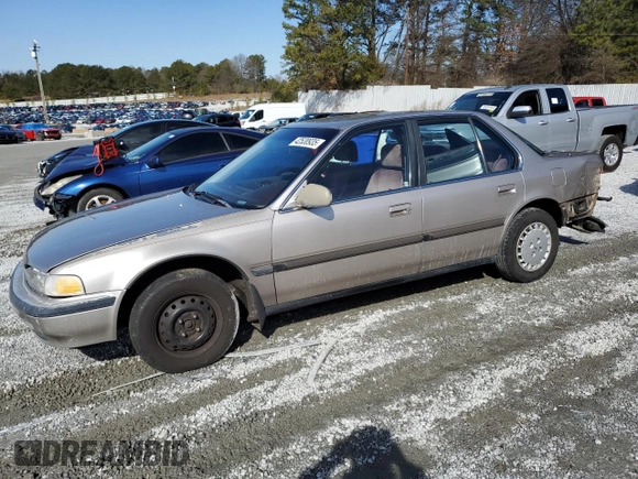 1991 Honda Accord LX with VIN JHMCB765XMC099044, listed as a Copart auction lot 42520935 with 165,870 mi miles and Salvage title. Bid and sale history available at DreamBid. Image 1.