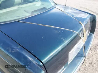 1995 Cadillac Concours z VIN 1G6KF52YXSU302434, wystawiony jako IAAI lot #42231281 z przebiegiem 153 236 mil mil oraz . Historia ofert i sprzedaży dostępna na DreamBid. Obrazek 6.