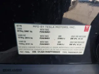 2015 Tesla Model S 85D with VIN 5YJSA1H46FF096603, listed as a IAAI auction lot 41084296 with 114,466 mi miles. Bid and sale history available at carsss.com. Image 9.