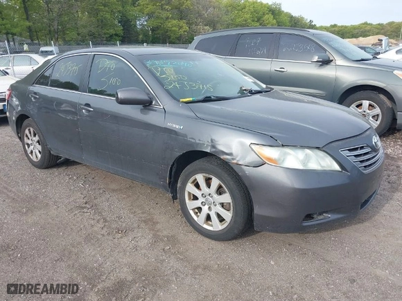 2007 Toyota Camry Hybrid with VIN 4T1BB46K77U006847, listed as a IAAI auction lot 39392090 with 999,999 mi miles. Bid and sale history available at carsss.com. Image 1.