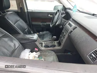 2009 Ford Flex SEL z VIN 2FMDK52C59BA62579, wystawiony jako IAAI lot #42029642 z przebiegiem 214 586 mil mil oraz . Historia ofert i sprzedaży dostępna na DreamBid. Obrazek 5.