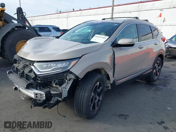 2017 Honda CR-V Touring with VIN 5J6RW2H99HL002127, listed as a IAAI auction lot 41517919 with 18,367 mi miles. Bid and sale history available at carsss.com. Image 2.