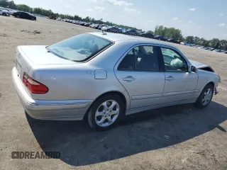 2002 Mercedes-Benz E-Class with VIN WDBJF65J12B393729, listed as a Copart auction lot 59722643 with 289,974 mi miles and Salvage Title. Bid and sale history available at carsss.com. Image 3.