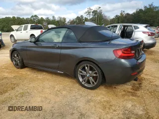 2016 BMW 2 Series M235i with VIN WBA1M1C57GV394290, listed as a Copart auction lot 76187684 with 60,838 mi miles and Salvage Title. Bid and sale history available at carsss.com. Image 2.