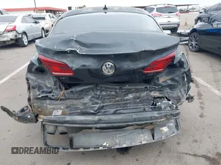 2013 Volkswagen CC Sport with VIN WVWBP7AN6DE504679, listed as a IAAI auction lot 42034362 with 148,527 mi miles. Bid and sale history available at carsss.com. Image 17.