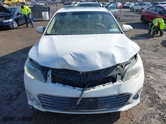 2013 Toyota Avalon XLE with VIN 4T1BK1EB4DU037825, listed as a IAAI auction lot 41963641 with 165,660 mi miles. Bid and sale history available at carsss.com. Image 6.