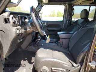 2021 Jeep Wrangler Unlimited Willys z VIN 1C4HJXDN9MW665660, wystawiony jako Copart lot #50406305 z przebiegiem 116 402 mil mil oraz Szkoda całkowita • Salvage title. Historia ofert i sprzedaży dostępna na DreamBid. Obrazek 7.