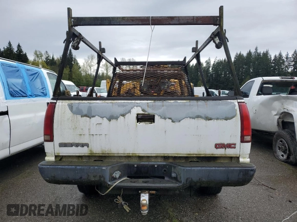 2000 GMC Sierra 1500 with VIN 1GTGC34R2YR191556, listed as a Copart auction lot 52346615 with Not Provided miles and Salvage Title. Bid and sale history available at DreamBid. Image 6.