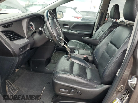 2016 Toyota Sienna SE with VIN 5TDXK3DCXGS732187, listed as a Copart auction lot 60566435 with Not provided miles and Clean title. Bid and sale history available at DreamBid. Image 7.