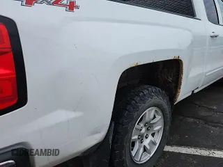 2016 Chevrolet Silverado 1500 LT with VIN 1GCVKREH4GZ346660, listed as a IAAI auction lot 42197452 with 127,410 mi miles. Bid and sale history available at carsss.com. Image 1.
