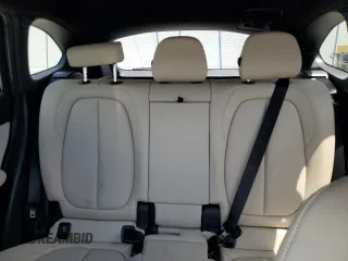 2021 BMW X1 sDrive28i z VIN WBXJG7C06M5S00879, wystawiony jako Copart lot #55572445 z przebiegiem 28 252 mil mil oraz Tytuł czysty. Historia ofert i sprzedaży dostępna na DreamBid. Obrazek 10.