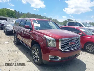 2018 GMC Yukon XL Denali z VIN 1GKS1HKJ6JR312495, wystawiony jako IAAI lot #42177446 z przebiegiem 94 268 mil mil oraz . Historia ofert i sprzedaży dostępna na DreamBid. Obrazek 1.