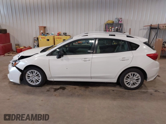 2017 Subaru Impreza Premium with VIN 4S3GTAD61H3727314, listed as a IAAI auction lot 42316108 with 111,215 mi miles and . Bid and sale history available at DreamBid. Image 14.