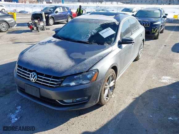 2013 Volkswagen Passat TDI SE w/Sunroof with VIN 1VWBN7A35DC136332, listed as a IAAI auction lot 41639915 with 119,310 mi miles. Bid and sale history available at carsss.com. Image 2.