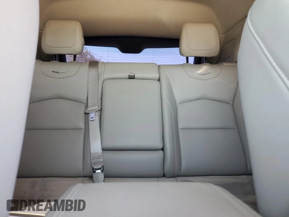 2023 Cadillac XT4 FWD Luxury z VIN 1GYAZAR46PF178003, wystawiony jako Copart lot #52024665 z przebiegiem 42 000 mil mil oraz Szkoda całkowita • Salvage title. Historia ofert i sprzedaży dostępna na DreamBid. Obrazek 10.