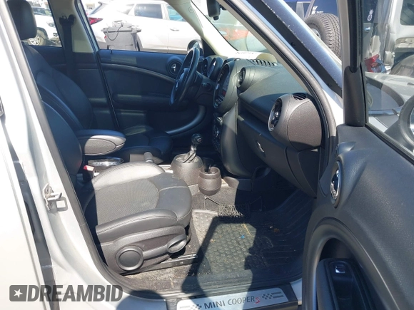 2013 MINI Countryman S z VIN WMWZC3C52DWP22139, wystawiony jako IAAI lot #42060025 z przebiegiem 210 124 mil mil oraz . Historia ofert i sprzedaży dostępna na DreamBid. Obrazek 5.