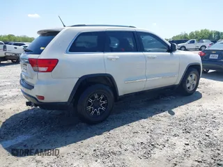 2011 Jeep Grand Cherokee Laredo with VIN 1J4RS4GG5BC573337, listed as a IAAI auction lot 41960369 with 185,518 mi miles and . Bid and sale history available at DreamBid. Image 4.
