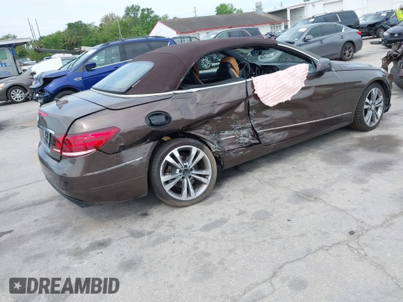 2014 Mercedes-Benz E-Class E 350 with VIN WDDKK5KF9EF242085, listed as a IAAI auction lot 41876938 with 75,760 mi miles. Bid and sale history available at carsss.com. Image 4.