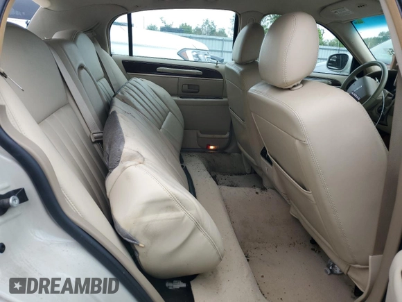 2006 Lincoln Town Car Signature z VIN 1LNHM81WX6Y645415, wystawiony jako Copart lot #57939425 z przebiegiem 91 829 mil mil oraz Szkoda całkowita • Salvage title. Historia ofert i sprzedaży dostępna na DreamBid. Obrazek 10.