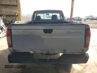 1998 Nissan Frontier XE with VIN 1N6DD21S1WC329392, listed as a Copart auction lot 73609304 with Not provided miles and Salvage title. Bid and sale history available at DreamBid. Image 6.