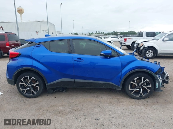 2020 Toyota C-HR LE with VIN JTNKHMBX7L1077218, listed as a IAAI auction lot 41994809 with 69,441 mi miles and . Bid and sale history available at DreamBid. Image 14.