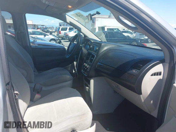 2012 Dodge Grand Caravan SXT with VIN 2C4RDGCG7CR204835, listed as a IAAI auction lot 41948688 with 125,466 mi miles and . Bid and sale history available at DreamBid. Image 5.