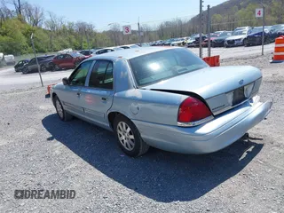 2007 Ford Crown Victoria LX z VIN 2FAFP74V37X122518, wystawiony jako IAAI lot #42071004 z przebiegiem 228 547 mil mil oraz . Historia ofert i sprzedaży dostępna na DreamBid. Obrazek 3.