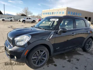 2013 MINI Countryman S ALL4 with VIN WMWZC5C59DWP30699, listed as a Copart auction lot 49117285 with 86,135 mi miles and Salvage Title. Bid and sale history available at DreamBid. Image 1.