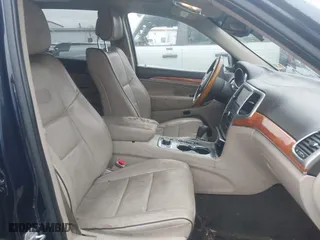 2012 Jeep Grand Cherokee Overland with VIN 1C4RJFCT9CC182216, listed as a IAAI auction lot 41490446 with 153,237 mi miles. Bid and sale history available at carsss.com. Image 5.