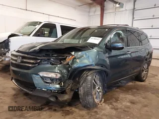 2016 Honda Pilot Elite with VIN 5FNYF6H09GB085621, listed as a IAAI auction lot 41788911 with 137,199 mi miles. Bid and sale history available at carsss.com. Image 2.