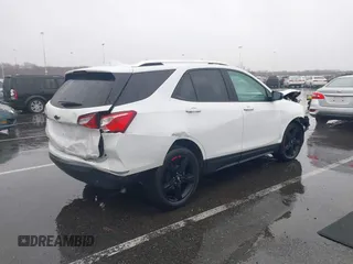 2021 Chevrolet Equinox Premier z VIN 2GNAXNEV7M6112087, wystawiony jako IAAI lot #41102702 z przebiegiem 32 995 mil mil oraz . Historia ofert i sprzedaży dostępna na DreamBid. Obrazek 4.