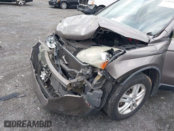 2011 Honda CR-V EX-L with VIN 5J6RE3H7XBL042313, listed as a IAAI auction lot 42034339 with 166,973 mi miles. Bid and sale history available at carsss.com. Image 6.