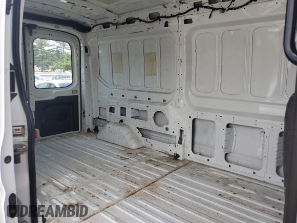 2016 Ford Transit Cargo with VIN 1FTYR2CM1GKB43234, listed as a Copart auction lot 65311135 with 59,502 mi miles and Salvage title. Bid and sale history available at DreamBid. Image 11.