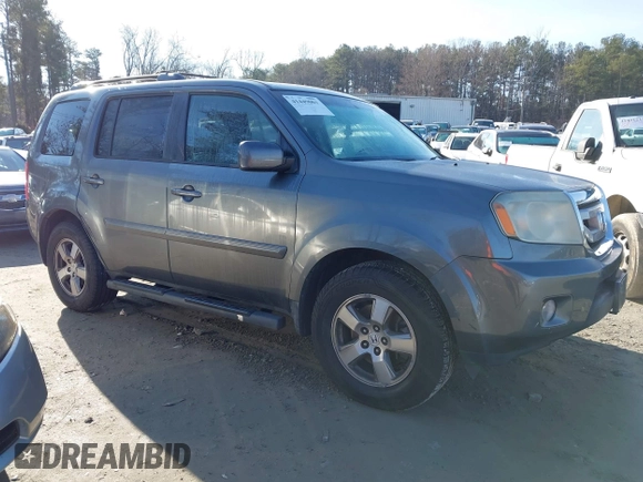 2011 Honda Pilot EX-L with VIN 5FNYF3H66BB018616, listed as a IAAI auction lot 41449001 with 221,499 mi miles and . Bid and sale history available at DreamBid. Image 12.