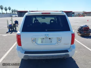 2004 Honda Pilot EX with VIN 2HKYF18424H564482, listed as a IAAI auction lot 41868124 with 173,484 mi miles. Bid and sale history available at carsss.com. Image 16.