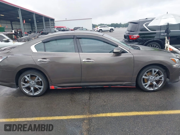2014 Nissan Maxima S z VIN 1N4AA5AP2EC455230, wystawiony jako IAAI lot #42413381 z przebiegiem 182 766 mil mil oraz . Historia ofert i sprzedaży dostępna na DreamBid. Obrazek 13.