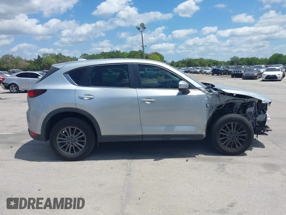 2017 Mazda CX-5 Sport with VIN JM3KFABLXH0135560, listed as a IAAI auction lot 42062016 with 153,416 mi miles. Bid and sale history available at carsss.com. Image 14.