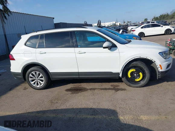 2020 Volkswagen Tiguan S z VIN 3VV1B7AX4LM098567, wystawiony jako IAAI lot #41504191 z przebiegiem 106 012 mil mil oraz . Historia ofert i sprzedaży dostępna na DreamBid. Obrazek 14.