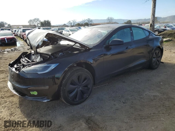 2023 Tesla Model S with VIN 5YJSA1E57PF507456, listed as a Copart auction lot 44649945 with 8,760 mi miles and Salvage title. Bid and sale history available at DreamBid. Image 1.