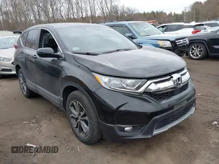 2021 Honda CR-V EX-L with VIN 2HKRW2H87MH639805, listed as a IAAI auction lot 41699013 with 73,304 mi miles. Bid and sale history available at carsss.com. Image 1.