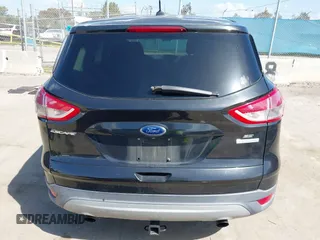 2015 Ford Escape SE with VIN 1FMCU0G91FUA18588, listed as a IAAI auction lot 41958047 with 111,523 mi miles. Bid and sale history available at carsss.com. Image 16.
