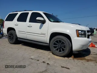 2013 Chevrolet Tahoe LT с VIN 1GNSCBE01DR158327, выставлен на аукционе Copart как лот 61760895 с пробегом 228 070 миль миль и Списание • Salvage title. История ставок и продаж доступна на DreamBid. Изображение 4.