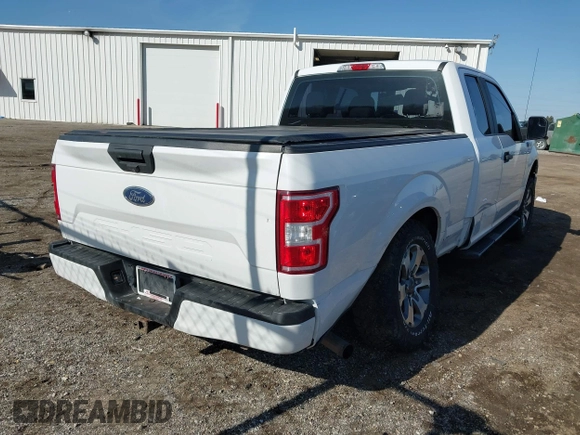 2019 Ford F-150 XL with VIN 1FTFX1E5XKKD17372, listed as a IAAI auction lot 41784569 with 208,528 mi miles. Bid and sale history available at carsss.com. Image 4.