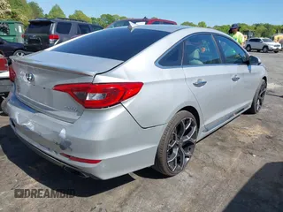 2015 Hyundai Sonata Sport with VIN 5NPE34AF6FH256579, listed as a IAAI auction lot 42052813 with 103,988 mi miles and . Bid and sale history available at DreamBid. Image 4.