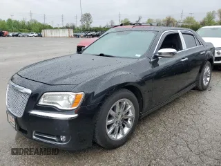 2013 Chrysler 300 with VIN 2C3CCAET1DH568910, listed as a Copart auction lot 50037004 with 136,228 mi miles and Salvage Title. Bid and sale history available at carsss.com. Image 1.
