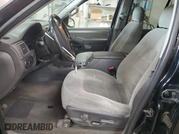 2004 Ford Explorer XLT with VIN 1FMDU73K94ZB08576, listed as a Copart auction lot 57076975 with 199,717 mi miles and Salvage title. Bid and sale history available at DreamBid. Image 7.