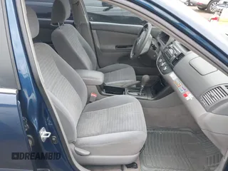 2005 Toyota Camry STD z VIN 4T1BE32K85U101891, wystawiony jako IAAI lot #41680923 z przebiegiem 146 472 mil mil oraz . Historia ofert i sprzedaży dostępna na DreamBid. Obrazek 5.