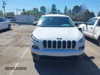 2016 Jeep Cherokee Sport with VIN 1C4PJMAB1GW314251, listed as a IAAI auction lot 41815330 with 124,588 mi miles. Bid and sale history available at carsss.com. Image 12.