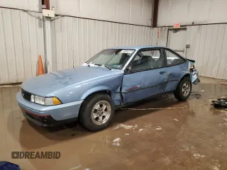 1989 Chevrolet Cavalier with VIN 1G1JC1113KJ278292, listed as a Copart auction lot 44942375 with 85,604 mi miles and Salvage Title. Bid and sale history available at DreamBid. Image 1.